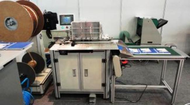 Masina automata de asamblat si inchis spirala de la Kronstadt Papier Technik S.a.