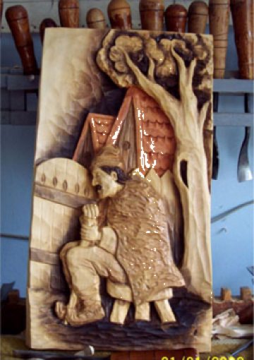 Sculptura Batran la poarta de la Marincu George